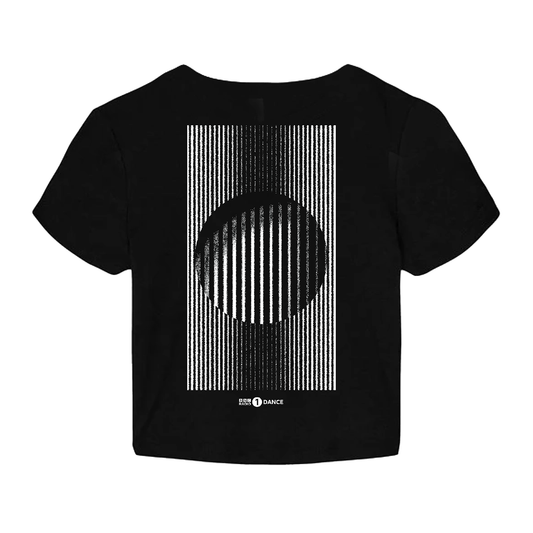 The BBC Radio 1 Radio 1's Big Weekend Dance Micro Rib Baby T-shirt is a black cropped tee with a large back graphic of vertical white lines and a central black circle, creating an optical illusion. "RAVE DANCE" is printed at the bottom.